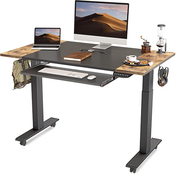 Photo 1 of FEZIBO DUAL MOTOR HEIGHT ADJUSTABLE ELECTRIC STANDING DESK WITH KEYBOARD TRAY, 48 X 24 INCH SIT STAND TABLE WITH SPLICE BOARD, BLACK FRAME/RUSTIC BROWN AND BLACK TOP DAMAGE TO BOX