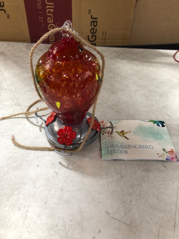 Photo 2 of WOSIBO Hummingbird Feeder for Outdoors Patio Large 32 Ounces Colorful Hand Blown Glass Hummingbird Feeder with Ant Moat Hanging Hook, Rope, Brush and Service Card (RED-Firework)