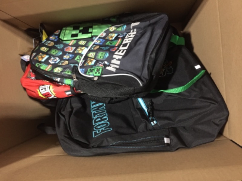 Photo 1 of BOX LOT OF school backpacks 