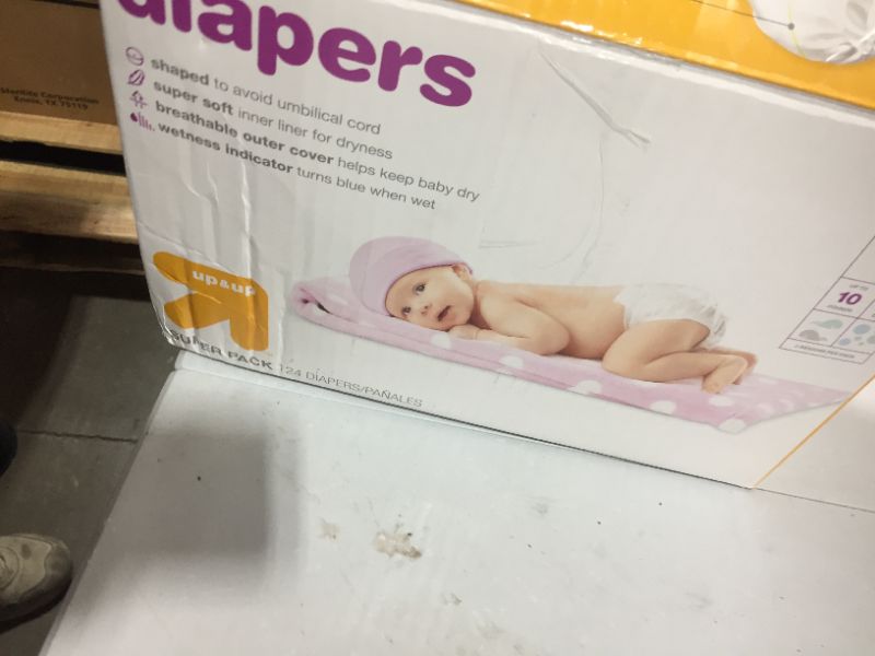 Photo 1 of Diapers Pack - up & up newborn/124