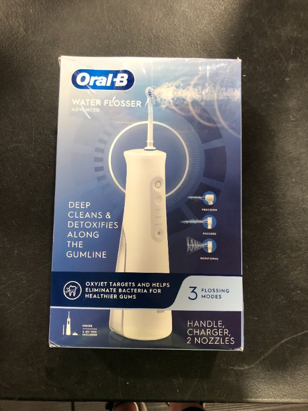 Photo 2 of Oral-B Water Flosser Advanced, Cordless Portable Oral Irrigator Handle with 3 Nozzles