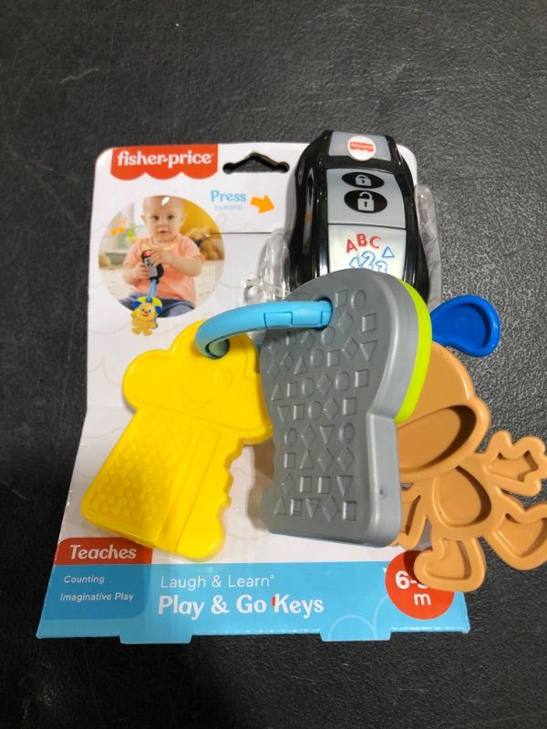 Photo 2 of Fisher-Price Laugh & Learn Play & Go Keys Musical Infant Toy
