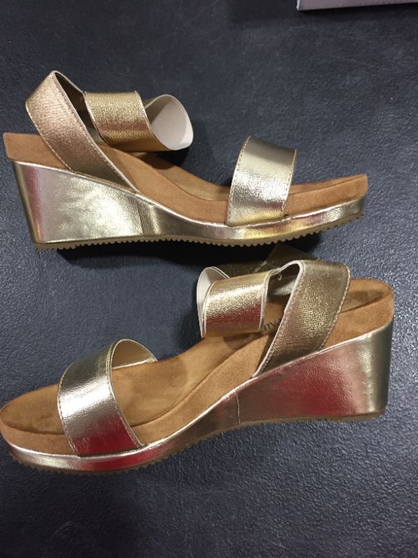 Photo 1 of Gold wedge  womens shoes 
Size 6
