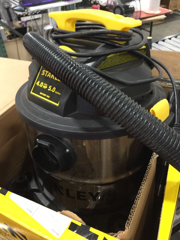 Photo 2 of STANLEY SL18115 Wet/Dry Vacuum, 5 Gallon, 4 Horsepower, Stainless Steel Tank, 4.0 HP, 50" Sealed Pressure, Silver+Yellow
