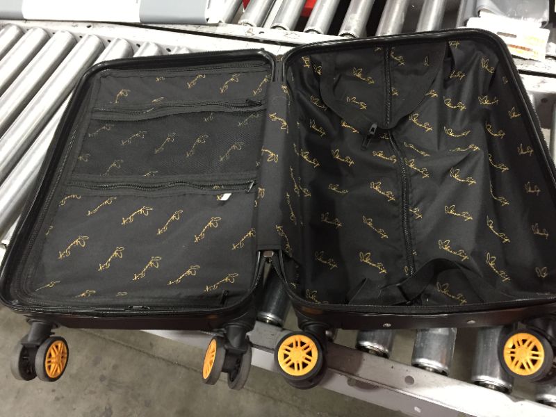 Photo 6 of 2 black and gold  suit cases 1 carry on and 1 big suit case 