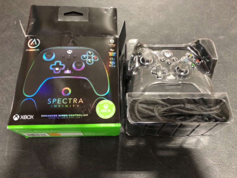 Photo 4 of PowerA Spectra Infinity Enhanced Wired Controller for Xbox Series X|S, Gamepad, Wired Video Game Controller, Gaming Controller, Xbox One, Officially Licensed - Xbox Series X. PRIOR USE.
