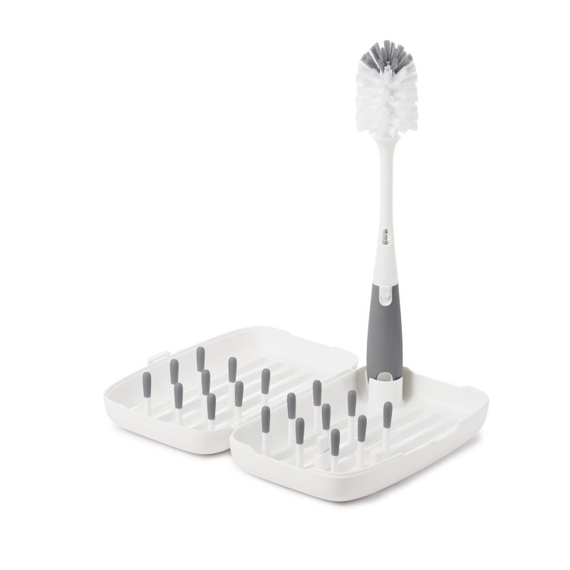 Photo 1 of OXO Tot on-the-Go Drying Rack with Bottle Brush in Gray + Munchkin Folding Baby Bottle Countertop Drying Rack