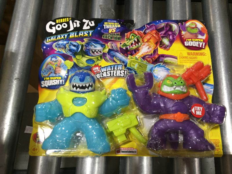 Photo 2 of 4 pack Heroes of Goo Jit Zu Galaxy Blast Versus Pack - Thrash Vs Quickdraw Rock Jaw with All NEW Water Blasters Toys for Kids Boys Ages 4+