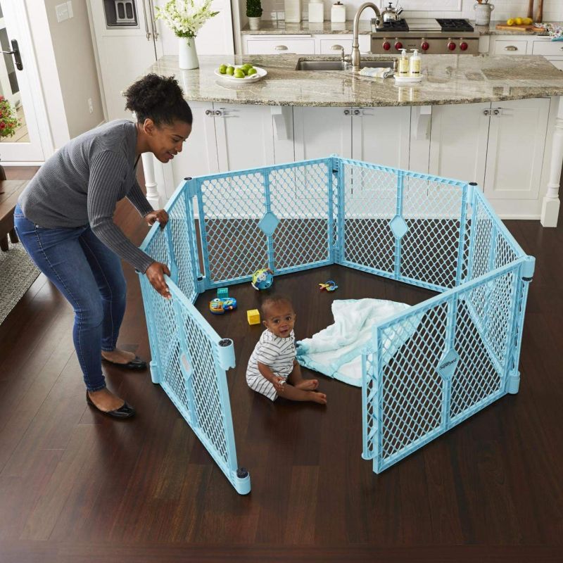 Photo 1 of Toddleroo by North States Superyard Indoor/Outdoor 6 Panel Baby Play Yard, Made in USA: Safe Play Area Anywhere. Carrying Strap for Easy Travel. Freestanding. 18.5 sq. ft. Enclosure (26" Tall, Aqua)
