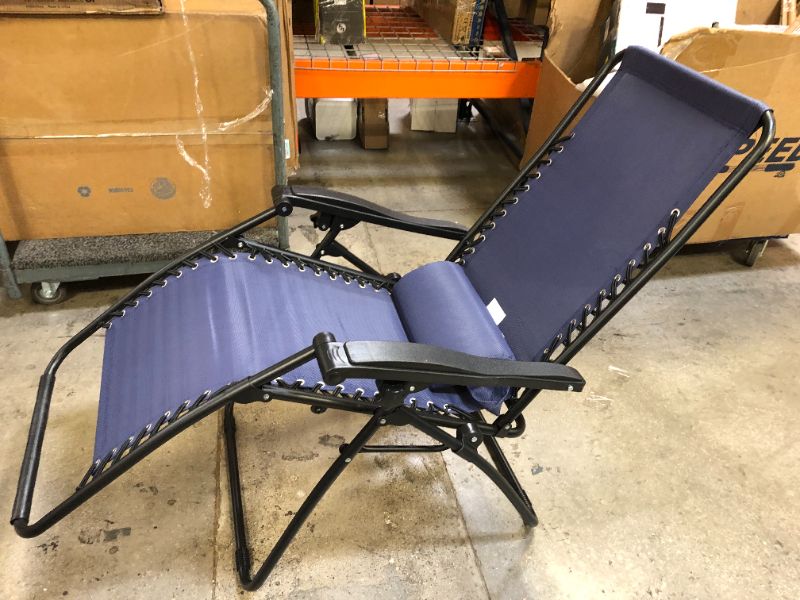 Photo 4 of Amazon Basics Outdoor Textilene Adjustable Zero Gravity Folding Reclining Lounge Chair with Pillow, Navy Blue
