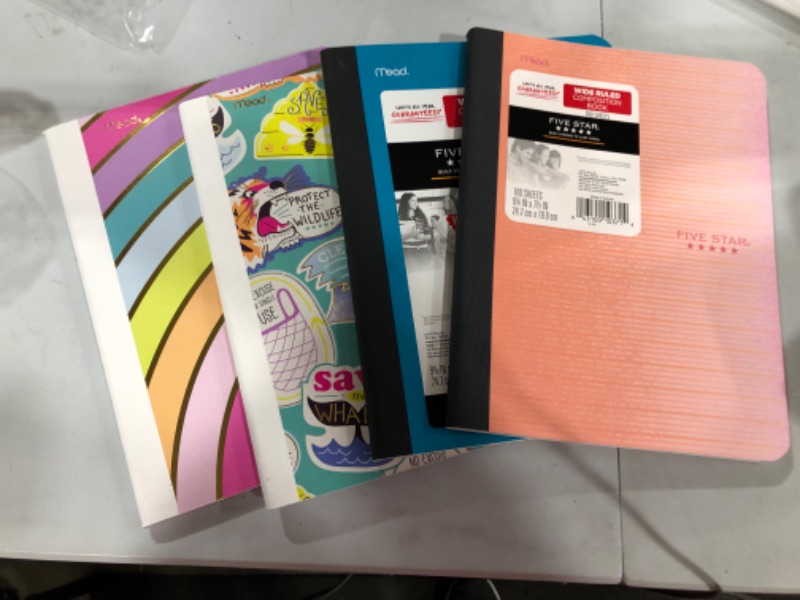 Photo 1 of 4 Composition notebooks wide ruled.

