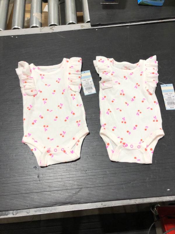 Photo 2 of Baby Girls' Cherry Rib Ruffle Bodysuit - Cat & Jack™ White (Size: 0-3M) Pack of 2