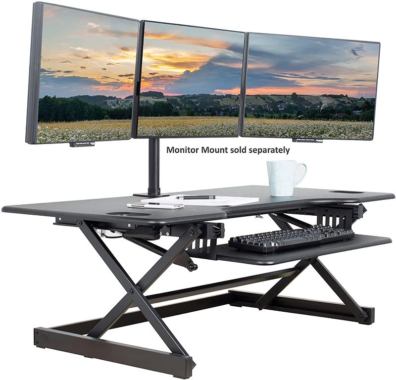 Photo 1 of Rocelco 46" Large Height Adjustable Standing Desk Converter, Quick Sit Standup Triple Monitor Riser, Gas Spring Assist Computer Workstation, Retractable Keyboard Tray, (R DADRB-46), Black
