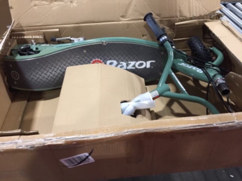 Photo 1 of Razor RX200 Off-Road Electric Scooter for Ages 13+ and up to 154 Lbs 8 Pneumatic Heavy Duty Tires 200W Chain-Driven Motor up to 12 Mph & up to 8-m