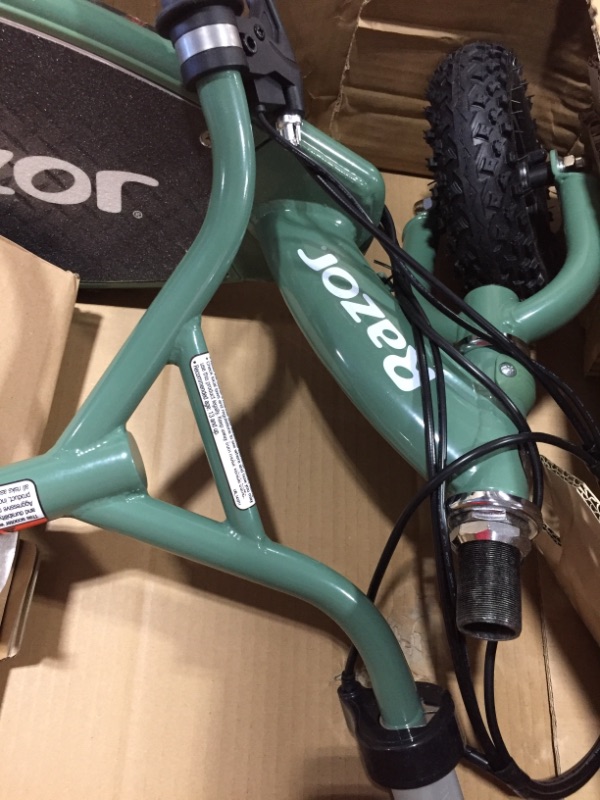 Photo 1 of Razor RX200 Off-Road Electric Scooter for Ages 13+ and up to 154 Lbs 8 Pneumatic Heavy Duty Tires 200W Chain-Driven Motor up to 12 Mph & up to 8-m