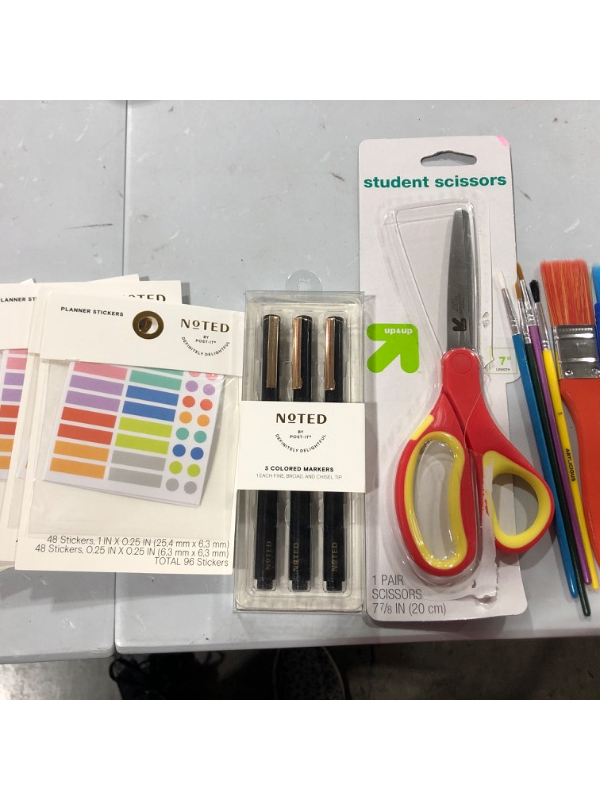 Photo 1 of 8 packs of planner stickers, 1 pair of scissors, 1 pack of 3 marker pens, and 10 paint brushes.