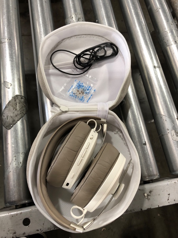 Photo 1 of Headphones with carry case