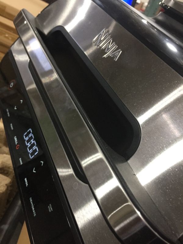Photo 1 of Ninja FG551 Foodi Smart XL 6-in-1 Indoor Grill with 4-Quart Air Fryer Roast Bake Dehydrate Broil and Leave-in Thermometer with Extra Large Capacity
