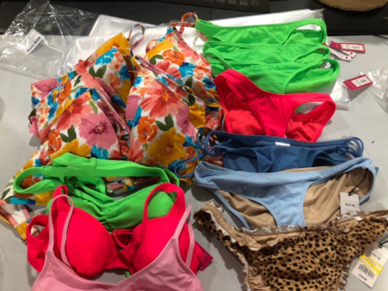 Photo 1 of BOX LOT of bikini tops and bottoms  variety of sizes (used , new, opened) 