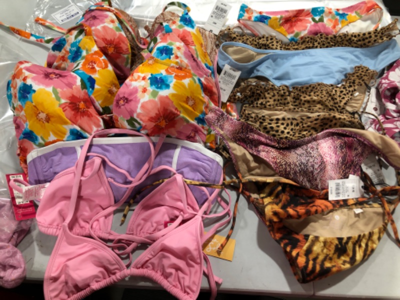 Photo 1 of BOX LOT of bikini tops and bottoms  variety of sizes (used , new, opened) 
