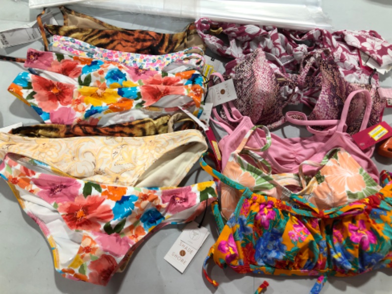 Photo 1 of BOX LOT of bikini tops and bottoms  variety of sizes (used , new, opened) 