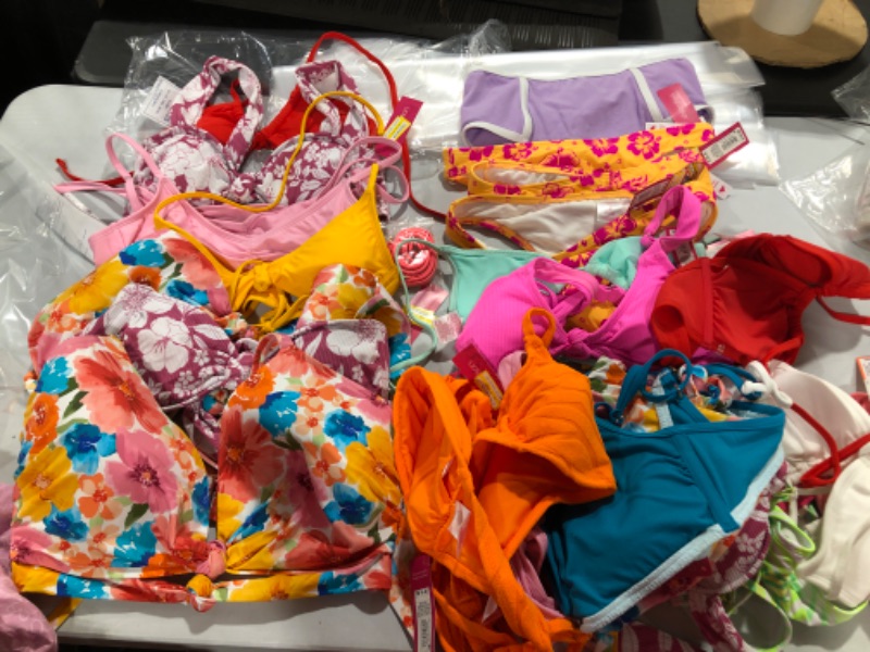 Photo 1 of BOX LOT of bikini tops and bottoms  variety of sizes (used , new, opened) 