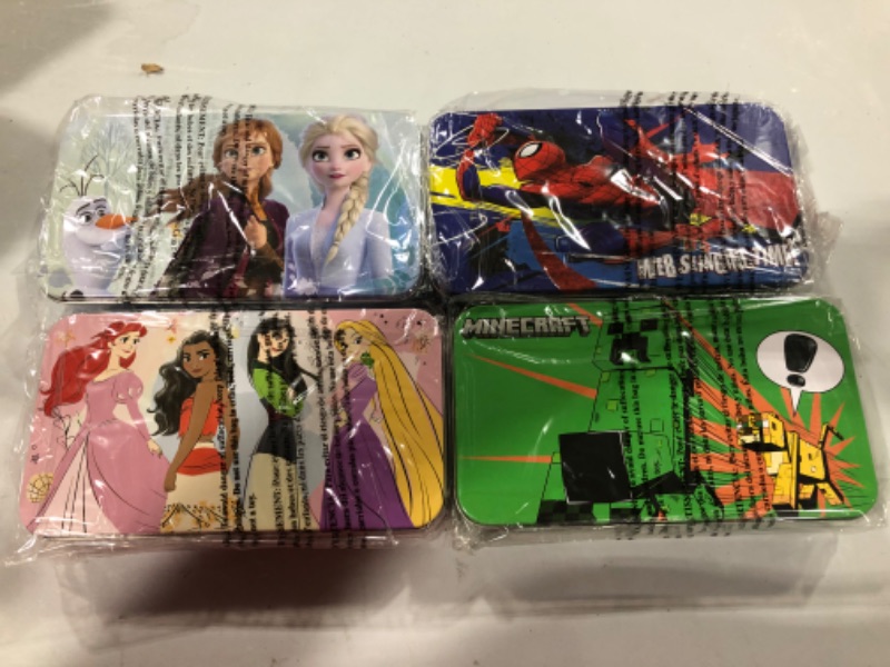 Photo 1 of Assorted Disney pencil tins 8"x3"x1.5" Qty. 4