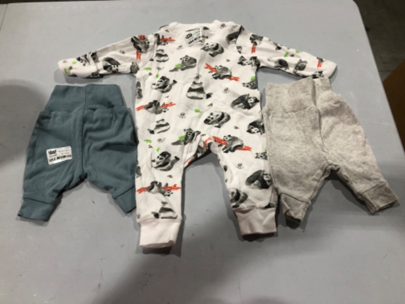 Photo 1 of Assorted Newborn Sized Clothes