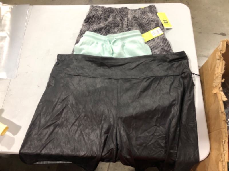 Photo 1 of Assorted Clothing (Sizes Vary)