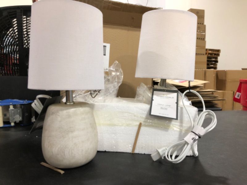Photo 1 of 2 PACK  -  Polyresin Wood Accent Lamp from Threshold™. Featuring a white barrel shade and a polyresin base with a wood-like finish. The lamp is fitted with a standard bulb base, and is 12.5-inch by 6.25-inch in size