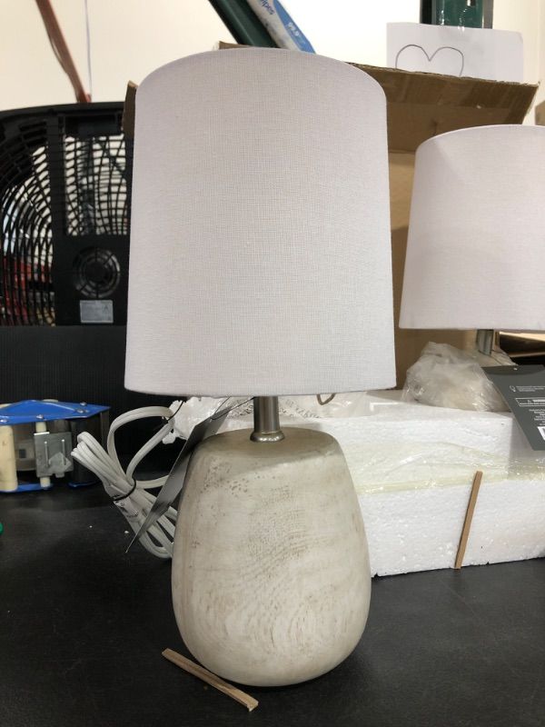 Photo 1 of 2 PACK  -  Polyresin Wood Accent Lamp from Threshold™. Featuring a white barrel shade and a polyresin base with a wood-like finish. The lamp is fitted with a standard bulb base, and is 12.5-inch by 6.25-inch in size