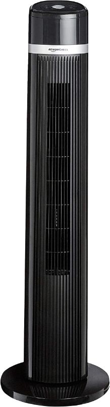 Photo 1 of Amazon Basics Oscillating 3 Speed Tower Fan with Remote
