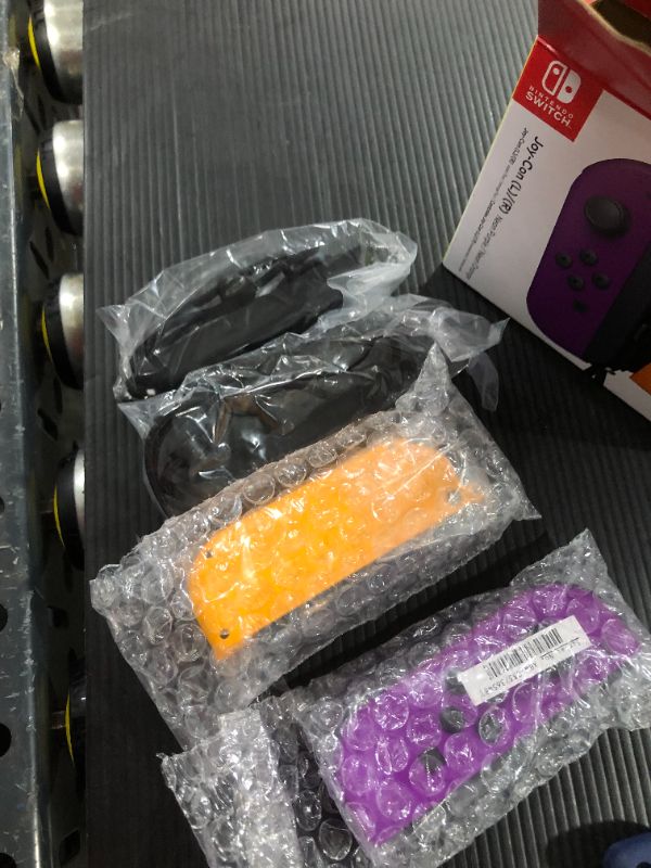 Photo 2 of Nintendo Neon Purple/ Neon Orange Joy-Con (L-R) - Switch
