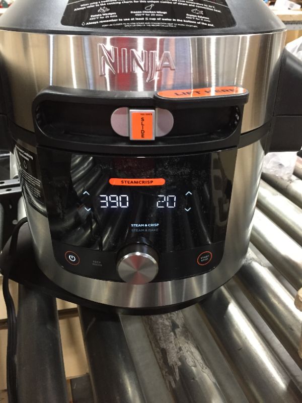 Photo 2 of Ninja OL701 Foodi 14-in-1 SMART XL 8 Qt. Pressure Cooker Steam Fryer with SmartLid & Thermometer + Auto-Steam Release, that Air Fries, Proofs & More, 3-Layer Capacity, 5 Qt. Crisp Basket, Silver/Black