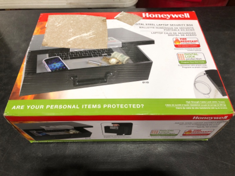 Photo 6 of HONEYWELL - 6110 Large Fire Resistant Steel Security Safe Box with Digital Lock, 0.48-Cubic Feet, Black. SMALL DENT IN LID.
