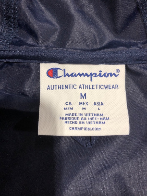 Photo 4 of Champion Women's Packable Jacket. BLUE.
SIZE MEDIUM.