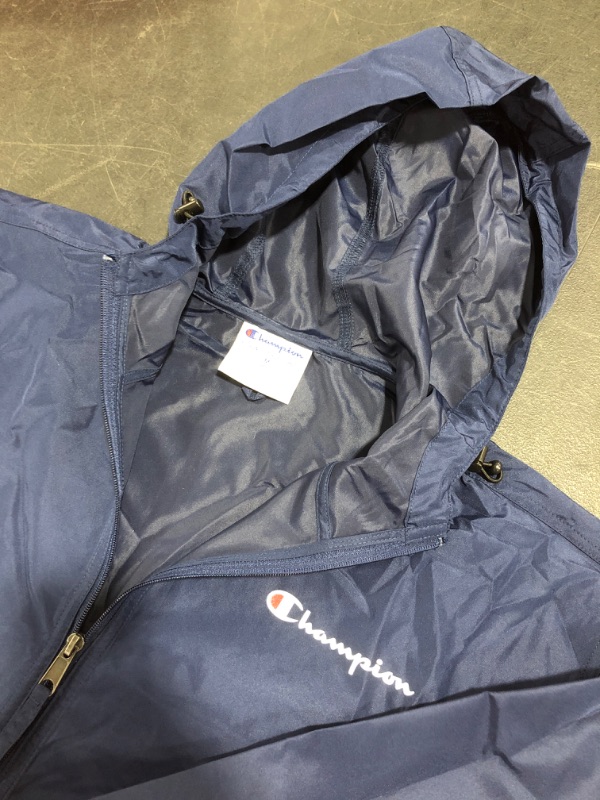 Photo 3 of Champion Women's Packable Jacket. BLUE.
SIZE MEDIUM.