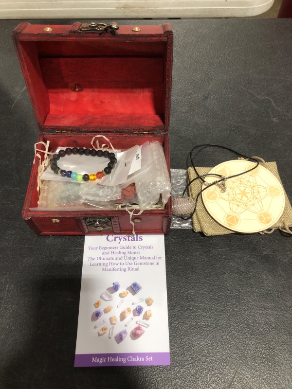 Photo 2 of 35PCS Crystals and Healing Stones Set, 7 Raw & Tumbled Chakra Stones, 80g Crushed Stones, Necklace, 8 Magic Candles, 7 Paper, Sage, Feather, Salt, Wooden Grid and Box for Beginners Meditation Yoga
