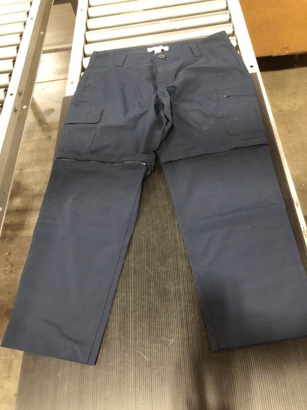 Photo 1 of AMAZON ESSENTIALS MEN'S PANTS WITH BUILT IN SHORTS. NAVY BLUE. SIZE 36X28. PRIOR USE.