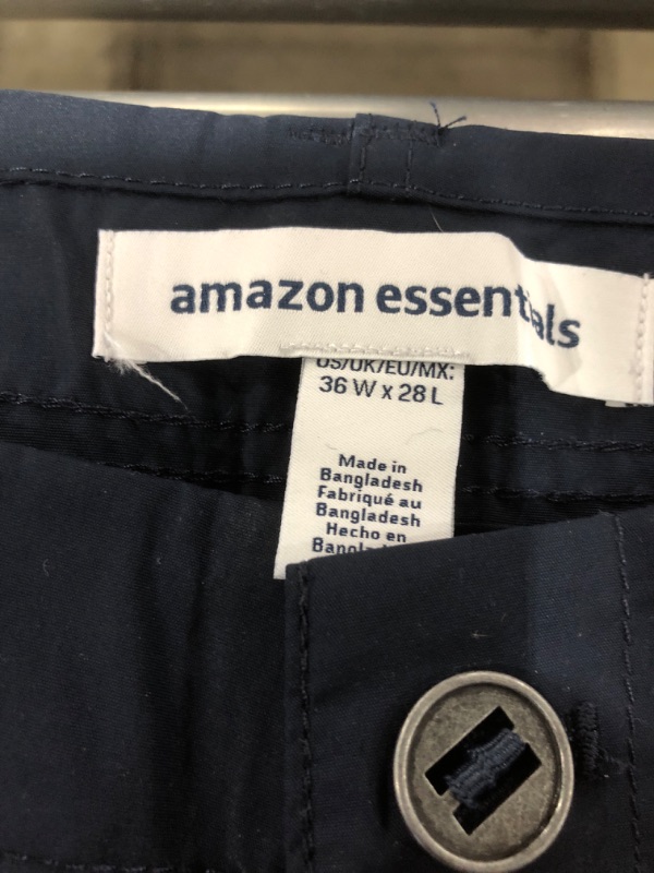 Photo 4 of AMAZON ESSENTIALS MEN'S PANTS WITH BUILT IN SHORTS. NAVY BLUE. SIZE 36X28. PRIOR USE.