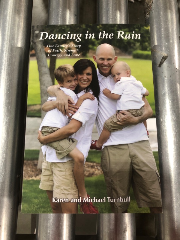 Photo 2 of Dancing in the Rain: One Family's Story of Faith, Strength, Courage and Love Paperback – May 27, 2021
