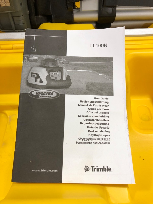 Photo 9 of Spectra Precision LL100N Laser Level Kit with HR320 Receiver and Clamp, 15' Grade Rod, Tripod, and System Case , Yellow
