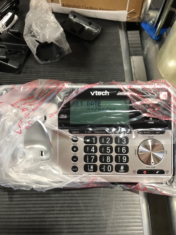 Photo 2 of VTech VS113-4 Extended Range 4 Handset Cordless Phone for Home with Call Blocking, Connect to Cell Bluetooth, 2" Backlit Screen, Big Buttons, and Answering System, Silver & Black
