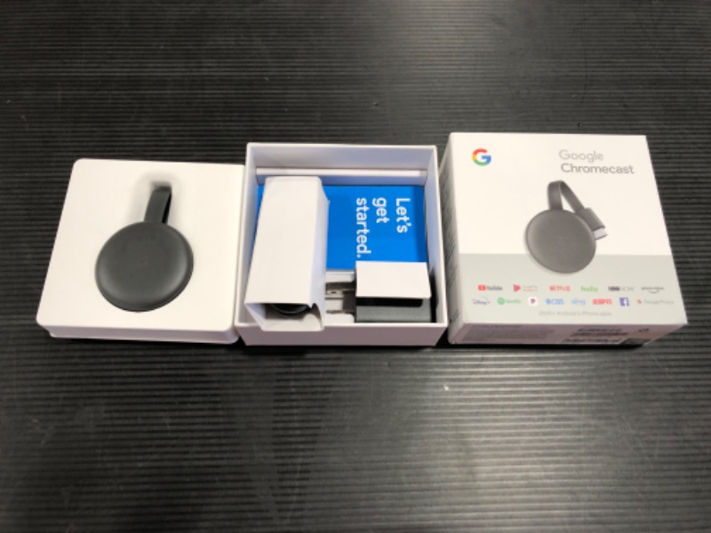 Photo 2 of Google Chromecast - Streaming Device with HDMI Cable - Stream Shows, Music, Photos, and Sports from Your Phone to Your TV
