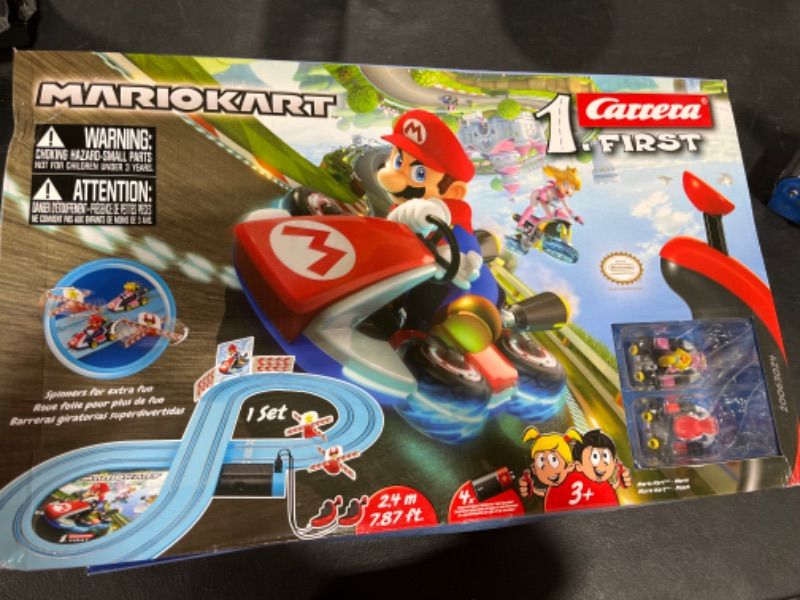 Photo 1 of Carrera First Mario Kart - Slot Car Race Track With Spinners - Includes 2 Cars: Mario and Yoshi - Battery-Powered Beginner Racing Set for Kids Ages 3 Years and Up

