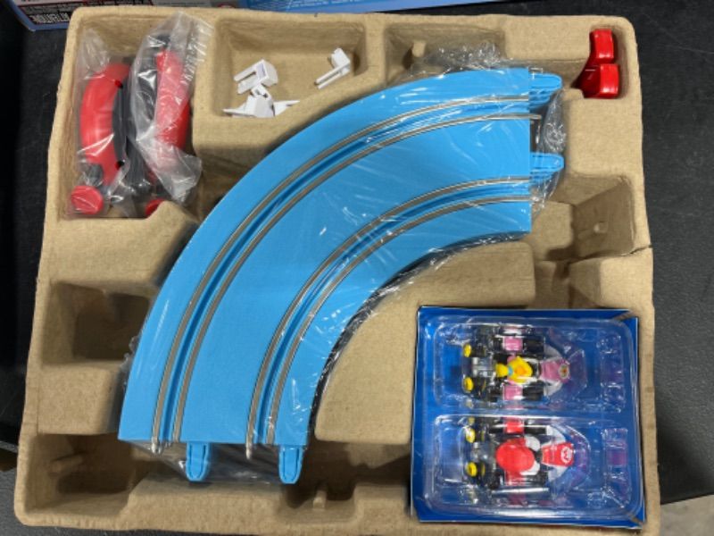 Photo 1 of Carrera First Mario Kart - Slot Car Race Track With Spinners - Includes 2 Cars: Mario and Yoshi - Battery-Powered Beginner Racing Set for Kids Ages 3 Years and Up
