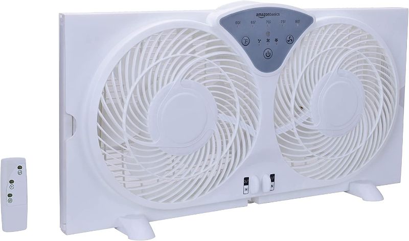 Photo 1 of Amazon Basics Digital Window Fan with Twin 9-Inch Reversible Airflow Blades and Remote Control
