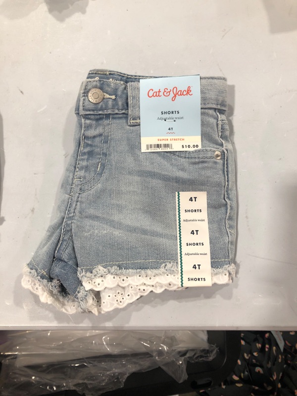 Photo 2 of Toddler Girls' Lace Hem Jean Shorts - Cat & Jack™ Light Wash 4T
