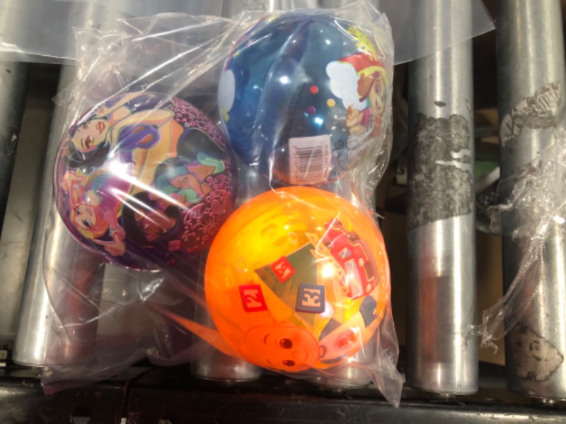 Photo 1 of Assorted Disney light up balls