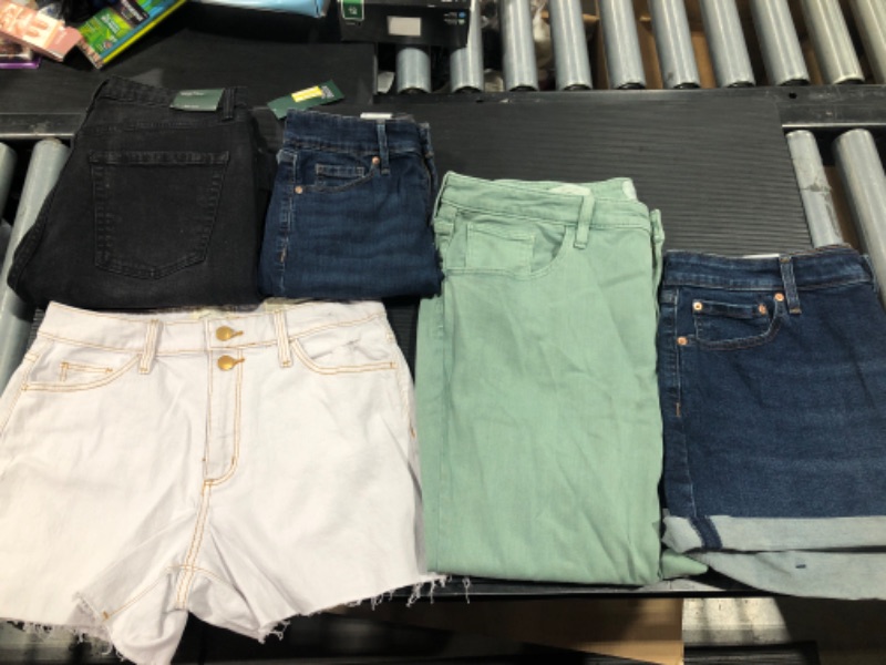 Photo 1 of Assorted Jeans and Shorts (Sizes Vary)